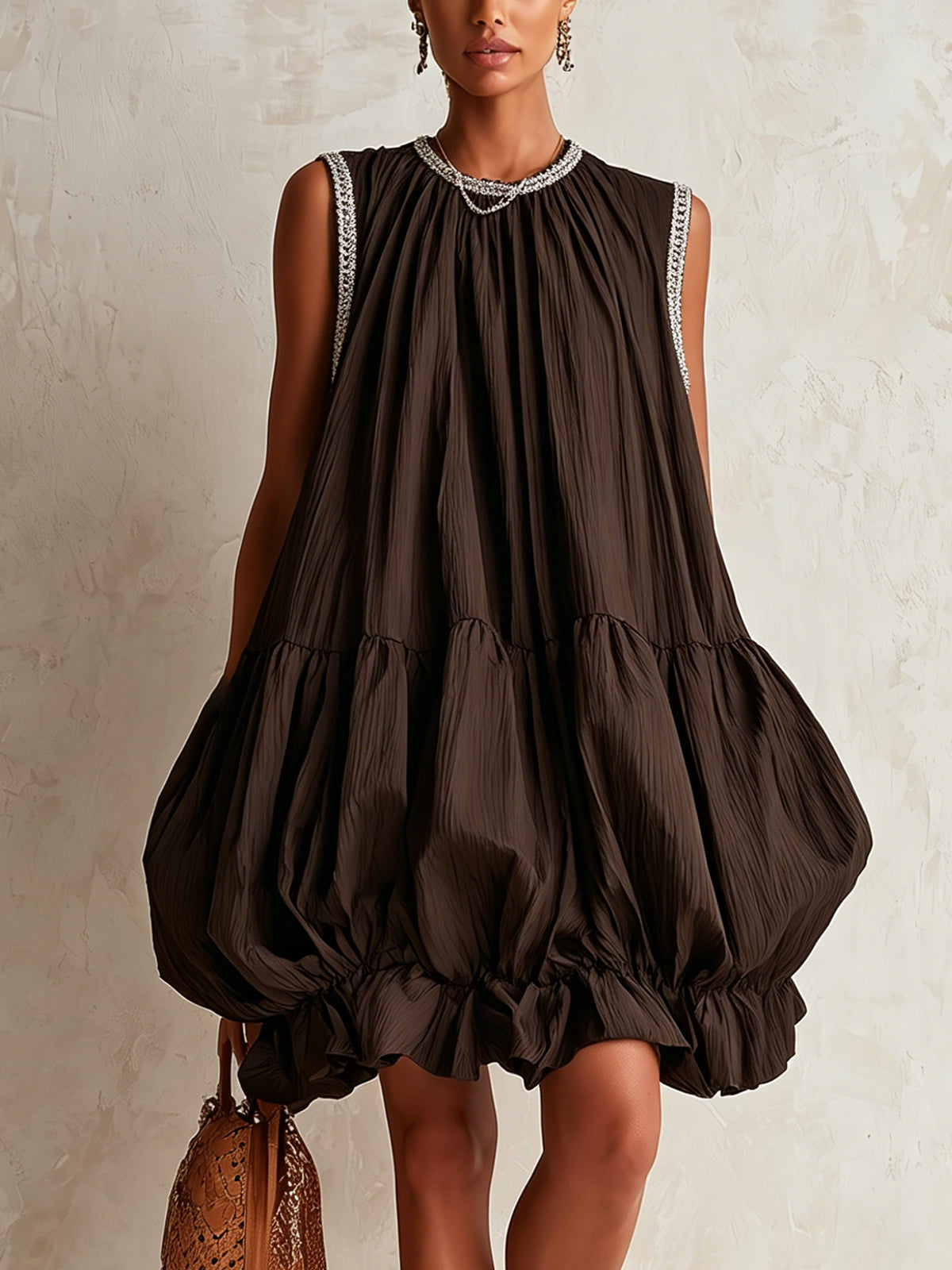 Brown sleeveless mini dress with bubble hem