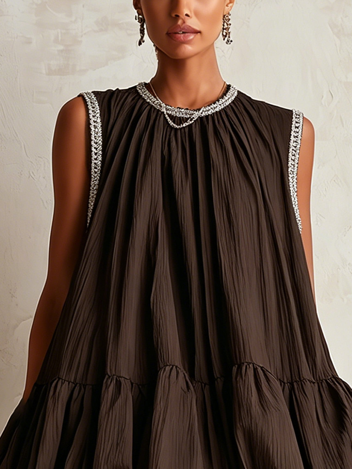 Brown sleeveless mini dress with bubble hem